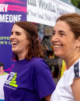 Staff And Volunteer At Event