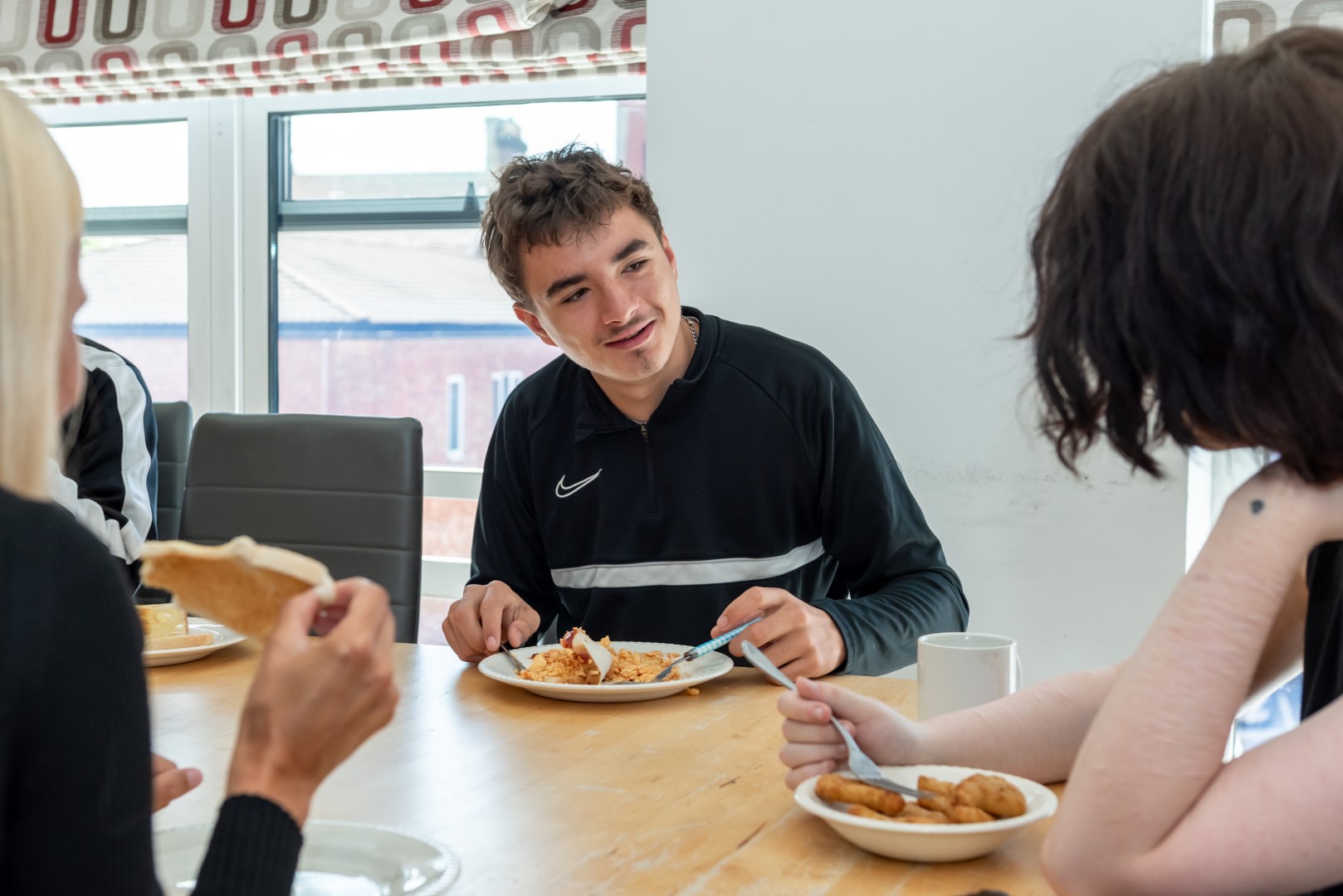 Foyer Supported Accommodation Yp Eating At Table