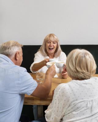 Close Up Friends With Coffee Cups
