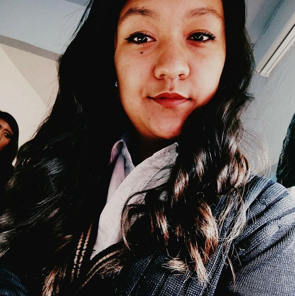 selfie shot of a young woman with black hair