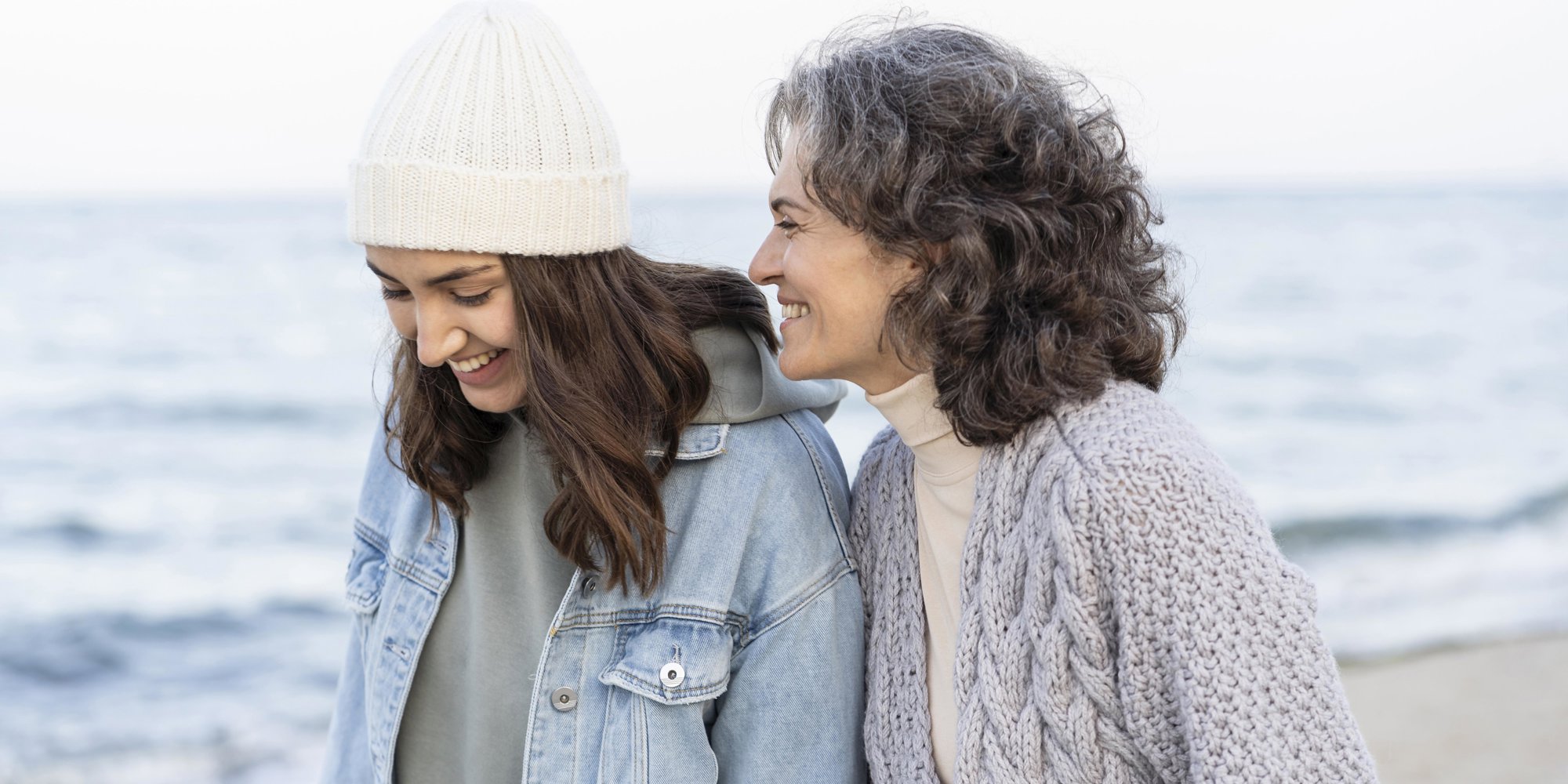 Foster parent/host and teen on the beach