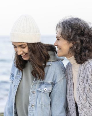 Foster parent/host and teen on the beach