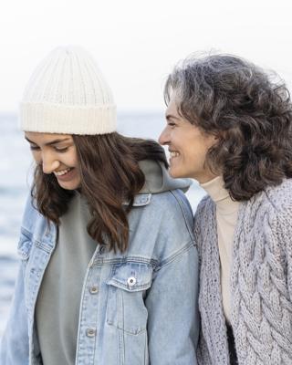 Foster parent/host and teen on the beach